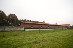 8-3-Positive ventilated barn with additional exhaust fans in chimneys